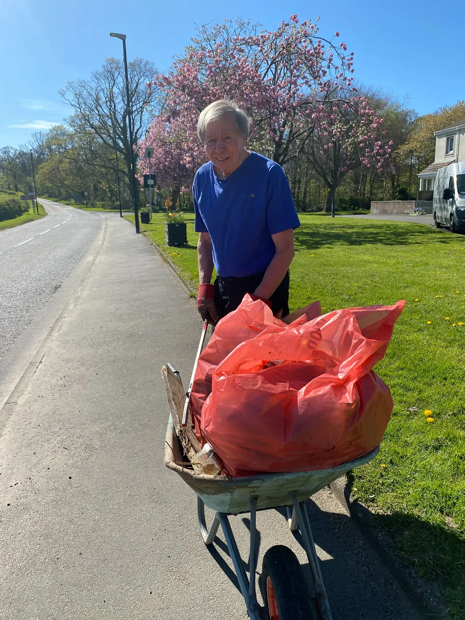 Ron from Dailly our litter picking. Full wheelbarrow or rubbish bags.