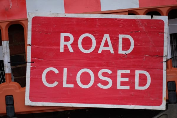 Road closed sign.