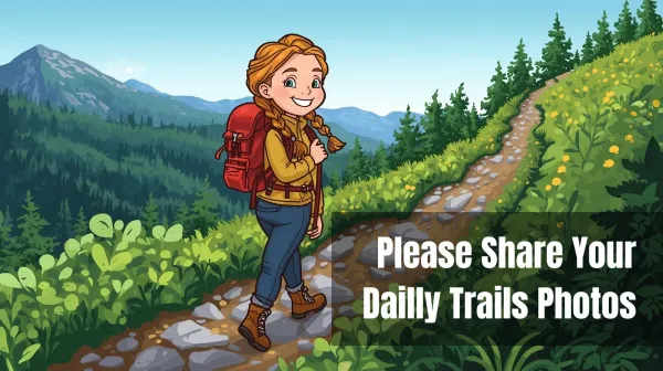 Redheaded girl in pigtails walking up a country path on a sunny day.